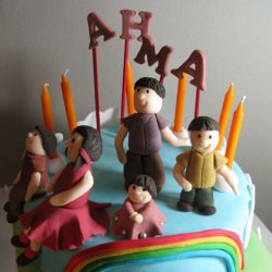 Fondant Figurines on A Rainbow Cake - Recipe photo by constantcraving