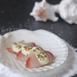 Hamachi with Curry Vinaigrette - Recipe photo by a communal table