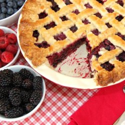 Triple Berry Pie - Recipe photo by sweetpeaskitchen