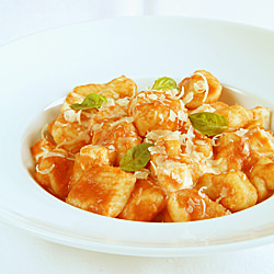 Gnocchi w/ Tomato Cream Sauce - Recipe photo by Lucy Vaserfirer
