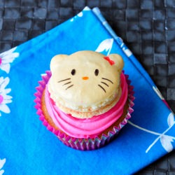 Hello Kitty Macaron Cupcake Toppers - Recipe photo by blondiescakes
