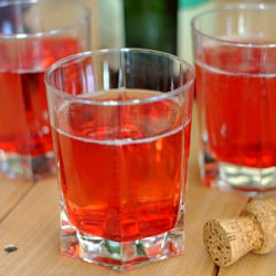 Pomegranate Bellini - Recipe photo by dinnersdishesanddesserts