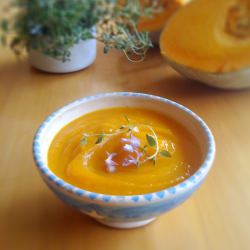 Pumpkin soup w/ rosemary flowers - Recipe photo by Alessandra Zecchini