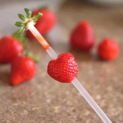 Hulling Strawberries - Recipe photo by barefeetinthekitchen