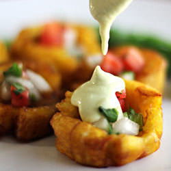 Tostones (Fried Plantains) - Recipe photo by Hilah Cooking