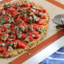 Cauliflower Pizza Crust - Recipe photo by Running to the Kitchen