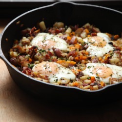 Baked Eggs with Potato & Bacon Hash - Recipe photo by ringfingertanline
