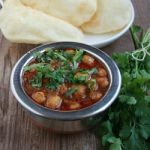 Chickpeas and Puffed Indian Bread - Recipe photo by judyscakesandtreats