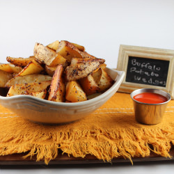 Baked Buffalo Potato Wedges - Recipe photo by Whitney Bond