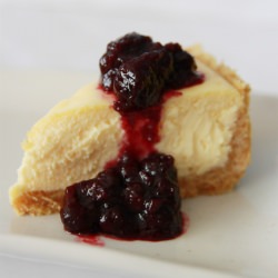 Cheesecake with Blueberry Sauce - Recipe photo by thecupcakeballroom