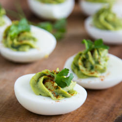 Guacamole Stuffed Eggs - Recipe photo by NatashasKitchen.com