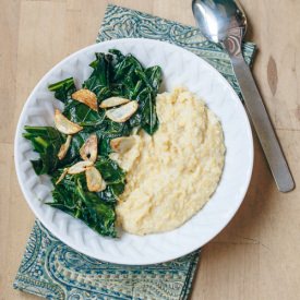 Creamy Corn Grits + Garlicky Greens - Recipe photo by veganmiam
