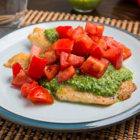Parmesan Crusted Pesto Tilapia - Recipe photo by closetcooking
