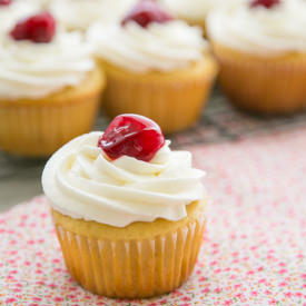 Cherry Surprise Honey Cupcakes - Recipe photo by NatashasKitchen.com