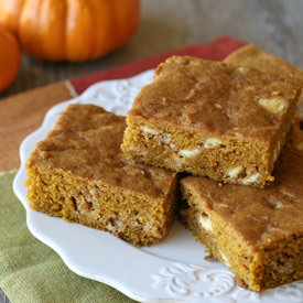 Pumpkin White Chocolate Chip Bars - Recipe photo by Glorious Treats