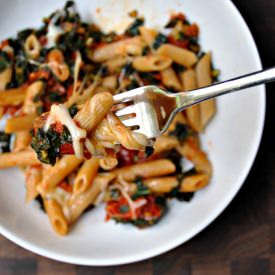 Penne w/ Tomatoes Kale & Mozzarella - Recipe photo by PinchandSwirl