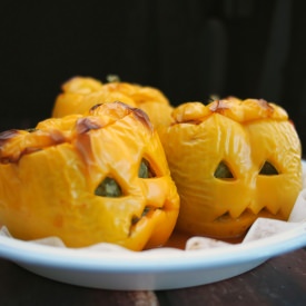 Jack O' Lantern Stuffed Peppers - Recipe photo by Belly Rumbles