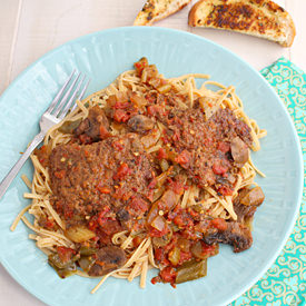 Swiss Steak in Slow Cooker - Recipe photo by Kitchen Simmer