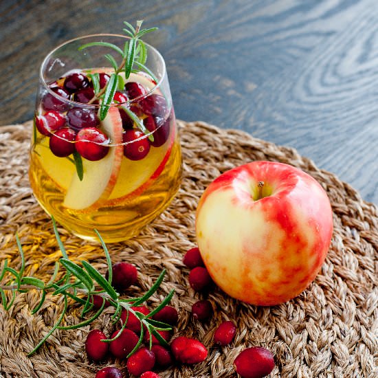 Cranberry, Cider + Rosemary Sangria - Recipe photo by IMPROVkitchen