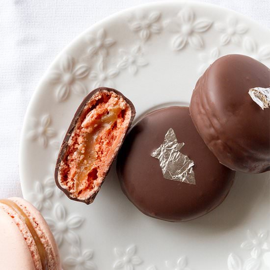 Chocolate dipped caramel macarons - Recipe photo by NowimaCook