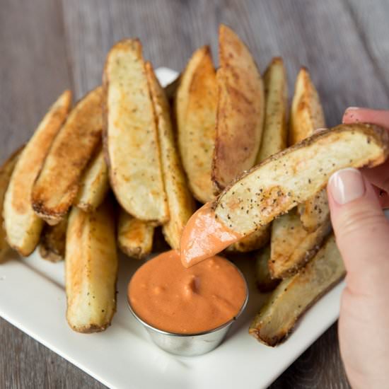 Crispy Oven Baked Potato Wedges - Recipe photo by TastesLovely