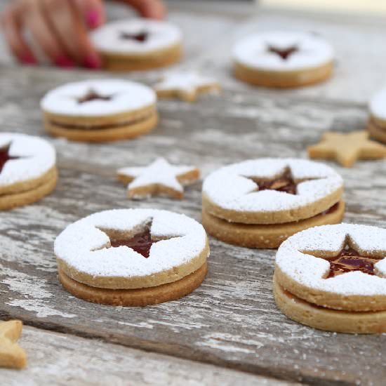 Peanut Butter & Jelly Linzer Cookie - Recipe photo by cinemaandspice