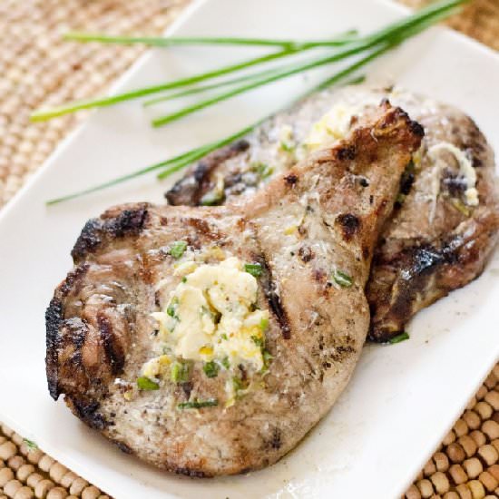 Pork Chops with Lemon Chive Butter - Recipe photo by amykayskitchen