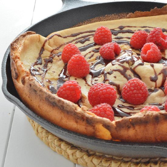 Raspberry Chocolate Dutch Baby - Recipe photo by chocolateandconnie