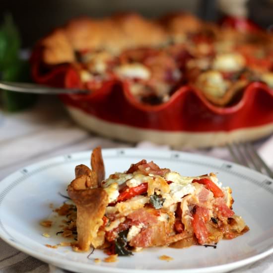 Goat Cheese & Bacon Tomato Pie - Recipe photo by Simple Southern Living