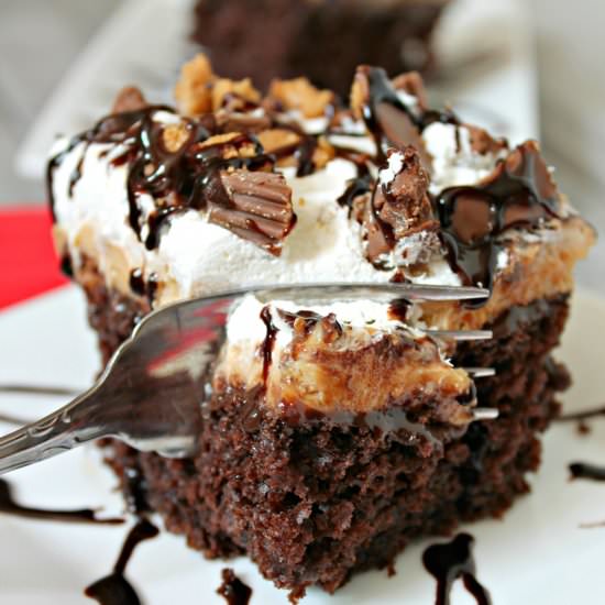 Reese's Peanut Butter Poke Cake - Recipe photo by SixSisters