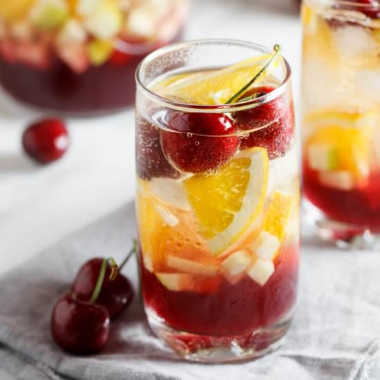 Cherry Pomegranate Sangria - Recipe photo by Simply Delicious