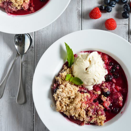 Triple Berry Crisp - Recipe photo by peachesncreamblog