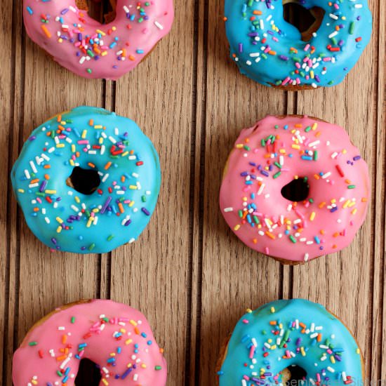 Frosted Sour Cream Cake Donuts - Recipe photo by thesemisweetsisters
