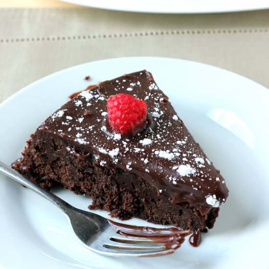 Flourless Chocolate Truffle Cake - Recipe photo by thesemisweetsisters