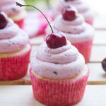 Almond Cupcakes w/ Cherry Frosting - Recipe photo by taste and tell