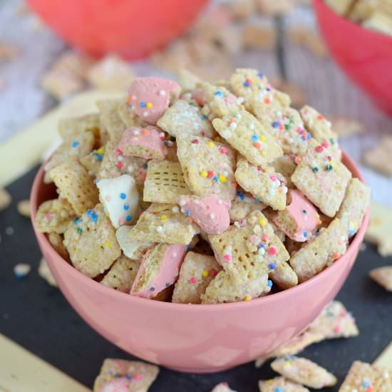 Frosted Animal Cookie Muddy Buddies - Recipe photo by BruCrewLife