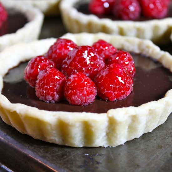Chocolate and Raspberry Tarts - Recipe photo by iwishbakingwasmyrealjob