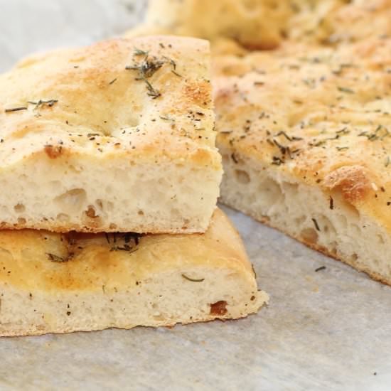 Garlic Herb Focaccia Bread - Recipe photo by syrupandbiscuits