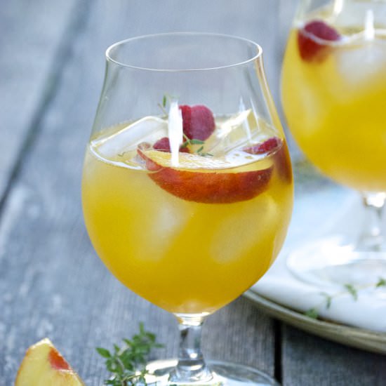 Peach Sangria w/ Chamomile + Thyme - Recipe photo by RelishingIt