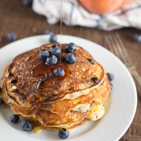 Blueberry Peach Vegan Pancakes - Recipe photo by The Salty Tomato LC