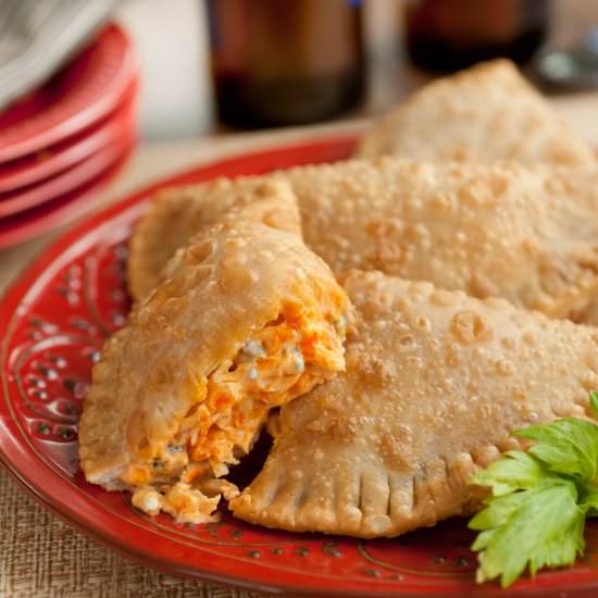 Buffalo Chicken Empanada - Recipe photo by mealsheelsandcocktails