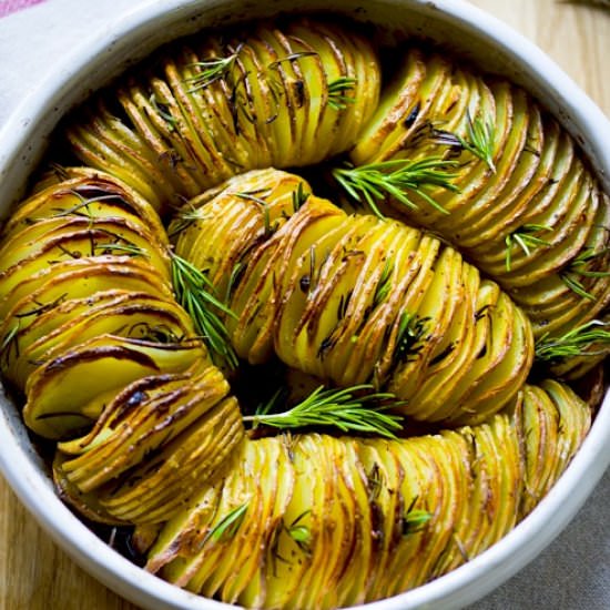 Rosemary garlic hasselback potatoes - Recipe photo by Feasting at Home