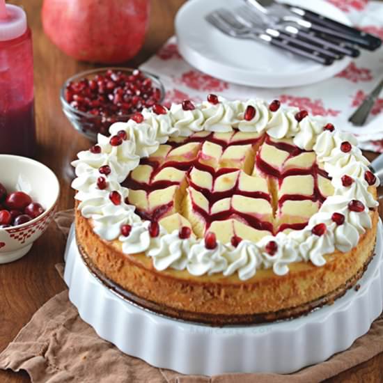 Cran-Pom White Chocolate Cheesecake - Recipe photo by bethcakes