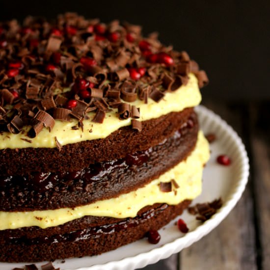 Chocolate Cherry Pom Eggnog Cake - Recipe photo by Melanie Makes