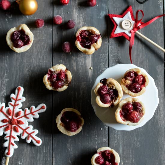 Cranberry Almond Butter Tarts - Recipe photo by peachesncreamblog