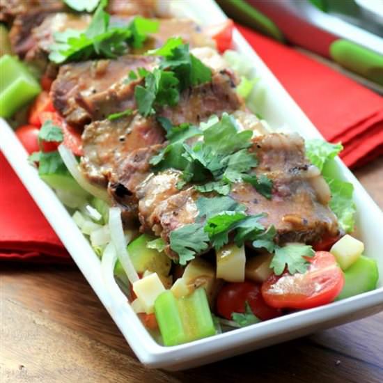 Mango Chili Steakhouse Salad - Recipe photo by noshingwiththenolands