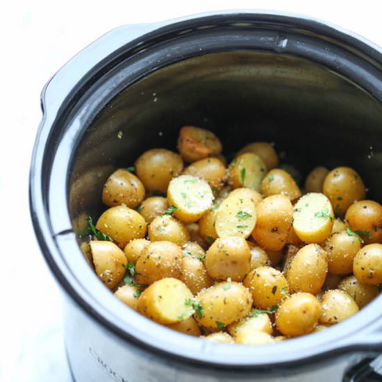 Crockpot Garlic Parmesan Potatoes - Recipe photo by damndelicious