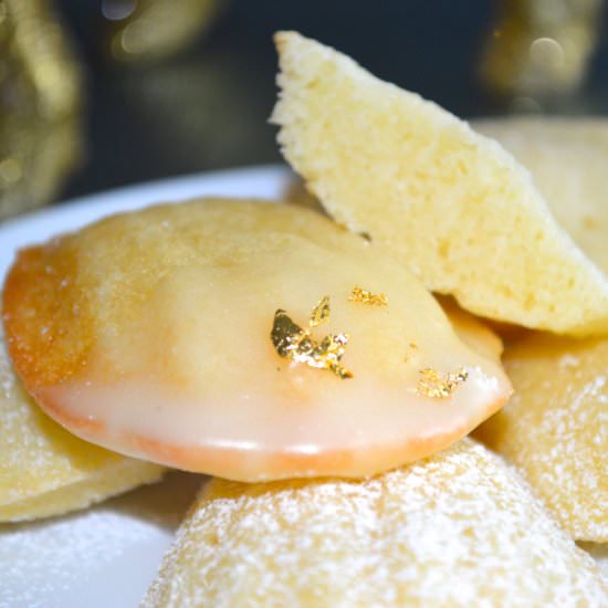 Orange Gold Glitter Madeleines - Recipe photo by bakerangel.com