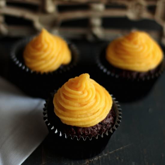 Cocoa cupcakes with mango frosting - Recipe photo by The Story of a Cake