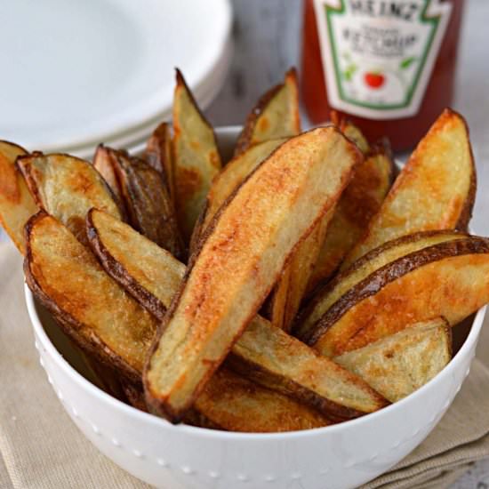 Thick cut oven fries - Recipe photo by Fridaycakenight